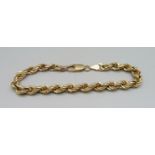 A 9ct gold bracelet, 8.8g, 21.5cm, (some links dented near the fastener)