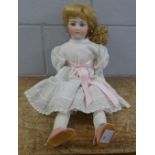 A modern bisque head doll, 55cm