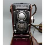 A Rolleiflex Franke & Heidecke TLR camera with leather case, numbered T2164258