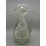 An early 19th Century glass decanter, 26cm