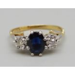 A yellow metal, three stone sapphire and diamond ring, hallmark worn, 2.7g, M