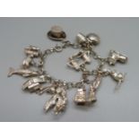 A silver charm bracelet, 58g