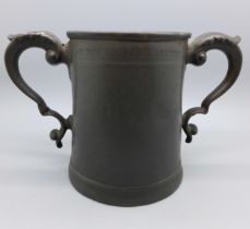 A 17th Century two handled tankard, a/f, with worn inscription, 'At The Man And Scythe Sacred to The