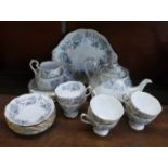 A Royal Albert Silver Maple six setting tea set with teapot, cream, sugar, and sandwich plate