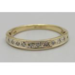 A 9ct gold, ten stone diamond half eternity ring, 2.1g, Q