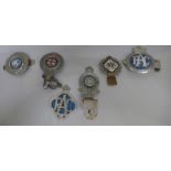 A collection of car badges, RAC, two marked Royal Automobile Club Associate and one marked The Royal