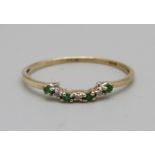 A 9ct gold, emerald and diamond ring, 0.9g, R