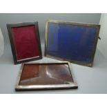 Three silver photograph frames, largest 17cm x 22cm, (middle size lacking back stand)
