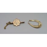 A 9ct gold brooch and a single 9ct gold earring, total weight 3.4g, earring a/f