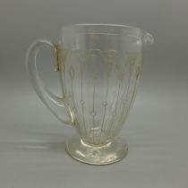 A Georgian etched glass milk jug, 102mm