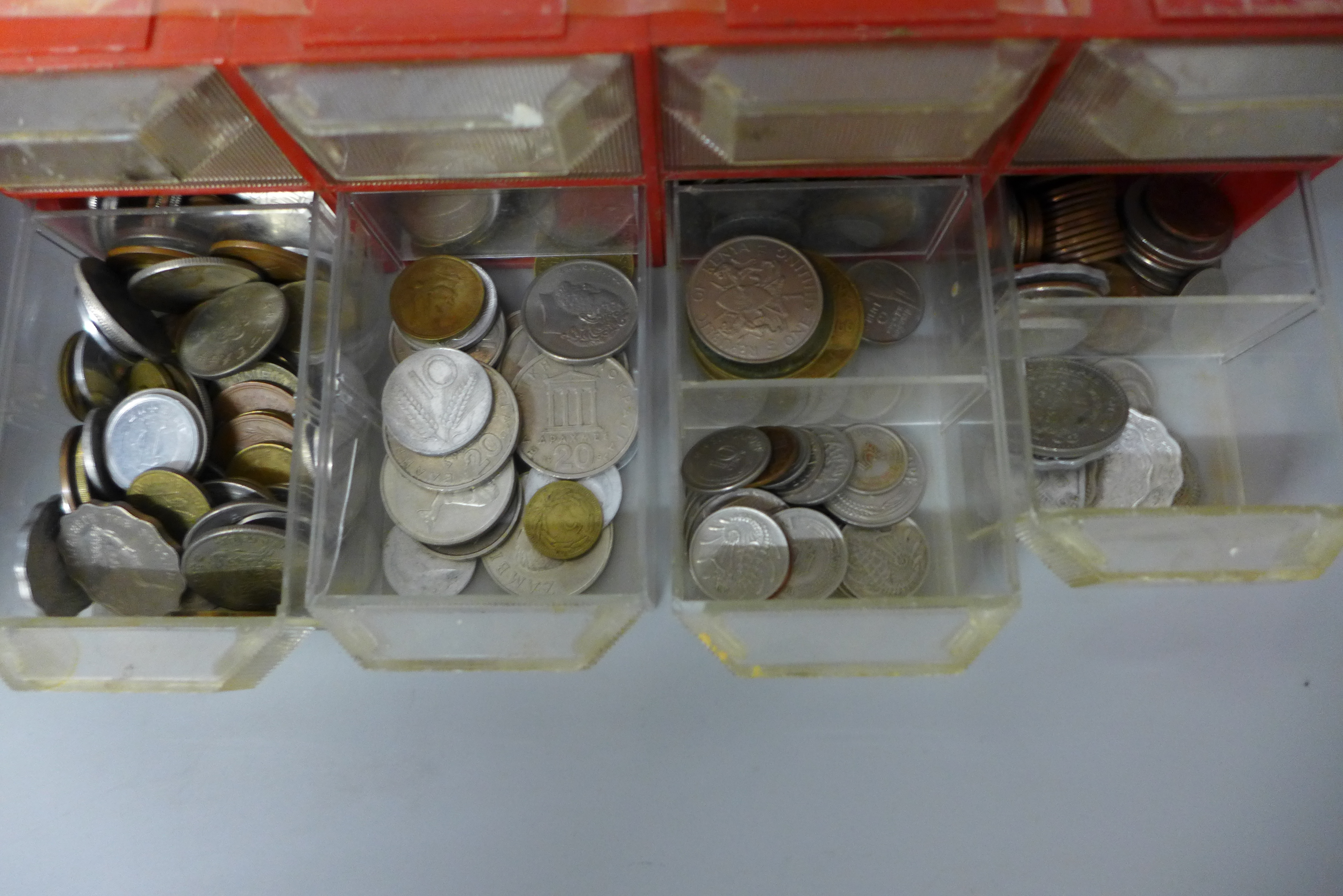 An eight drawer plastic cabinet with sorted foreign coins and a tin of coins - Image 3 of 3