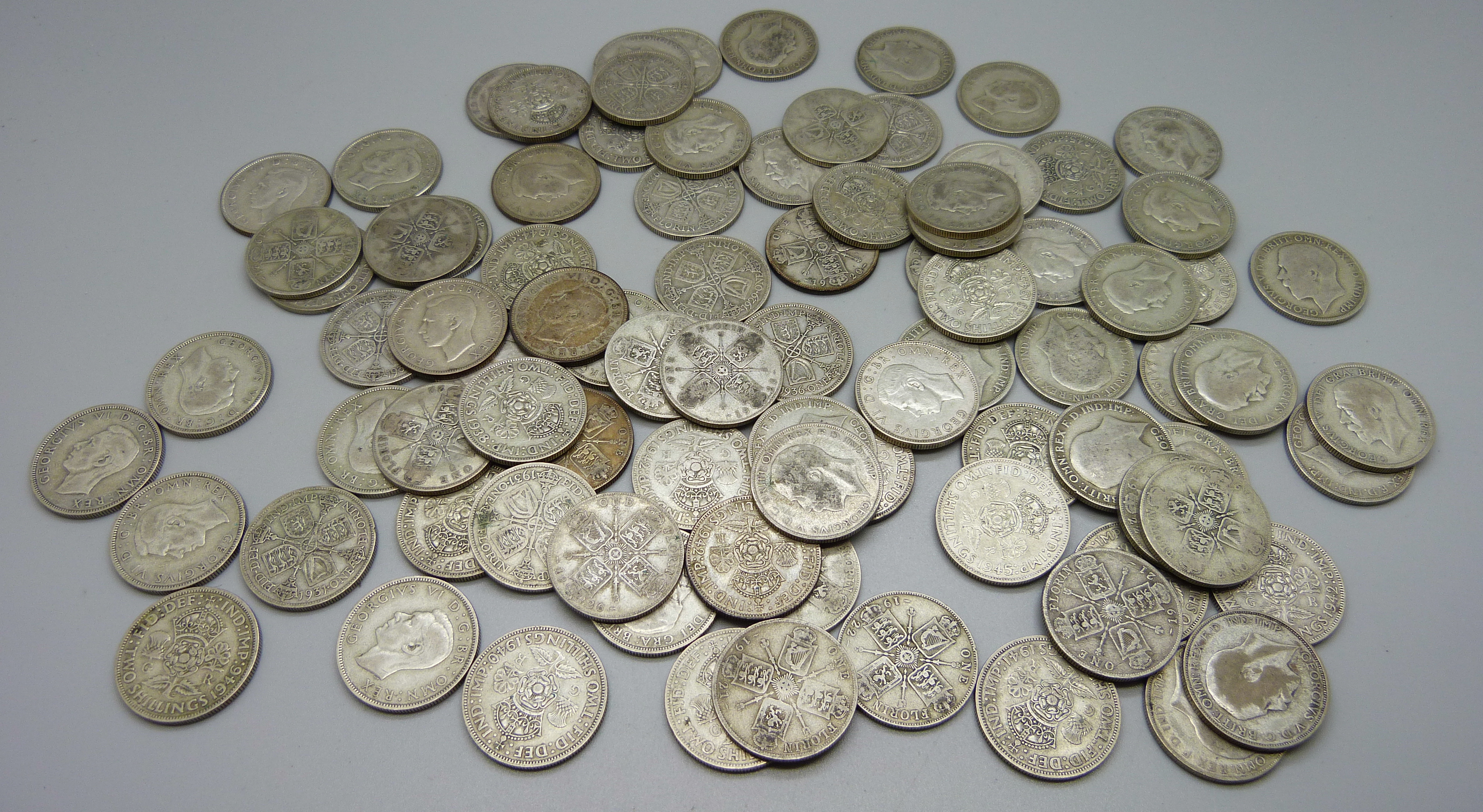 A collection of pre 1947 florin coins, 977g