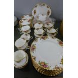 A Royal Albert Old Country Roses twelve setting tea and dinner service with sandwich plates and
