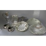 A collection of plated ware including a Walker & Hall basket, a claret jug with plated top, etc.