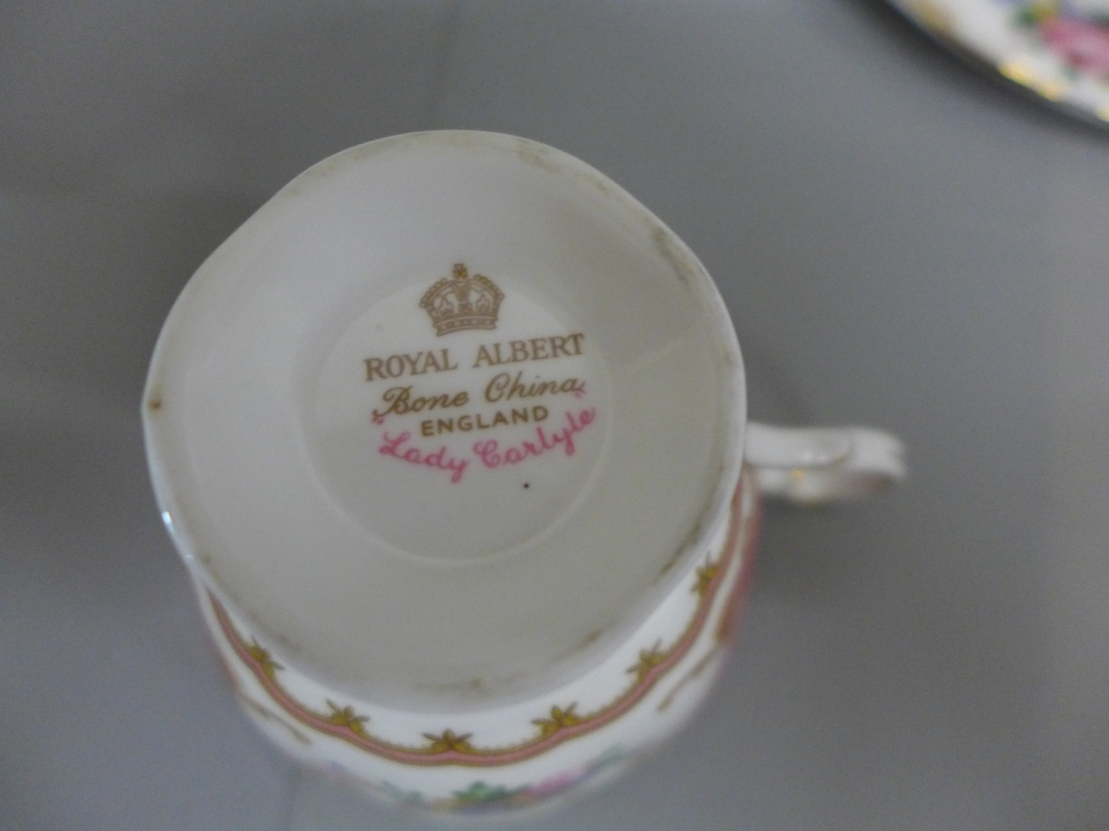 Four Royal Albert 'Lady Carlysle' tea cups, eight saucers, a tea plate and one larger saucer - Image 3 of 3