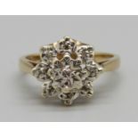 A 9ct gold cluster ring with illusion set diamonds, 3.2g, L