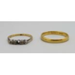 A 22ct gold wedding ring, 2.7g, P, and an 18ct gold ring, lacking one stone, 1.3g, K