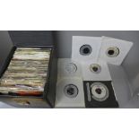 A case of 7" singles, 1970's and 1980's pop and new wave
