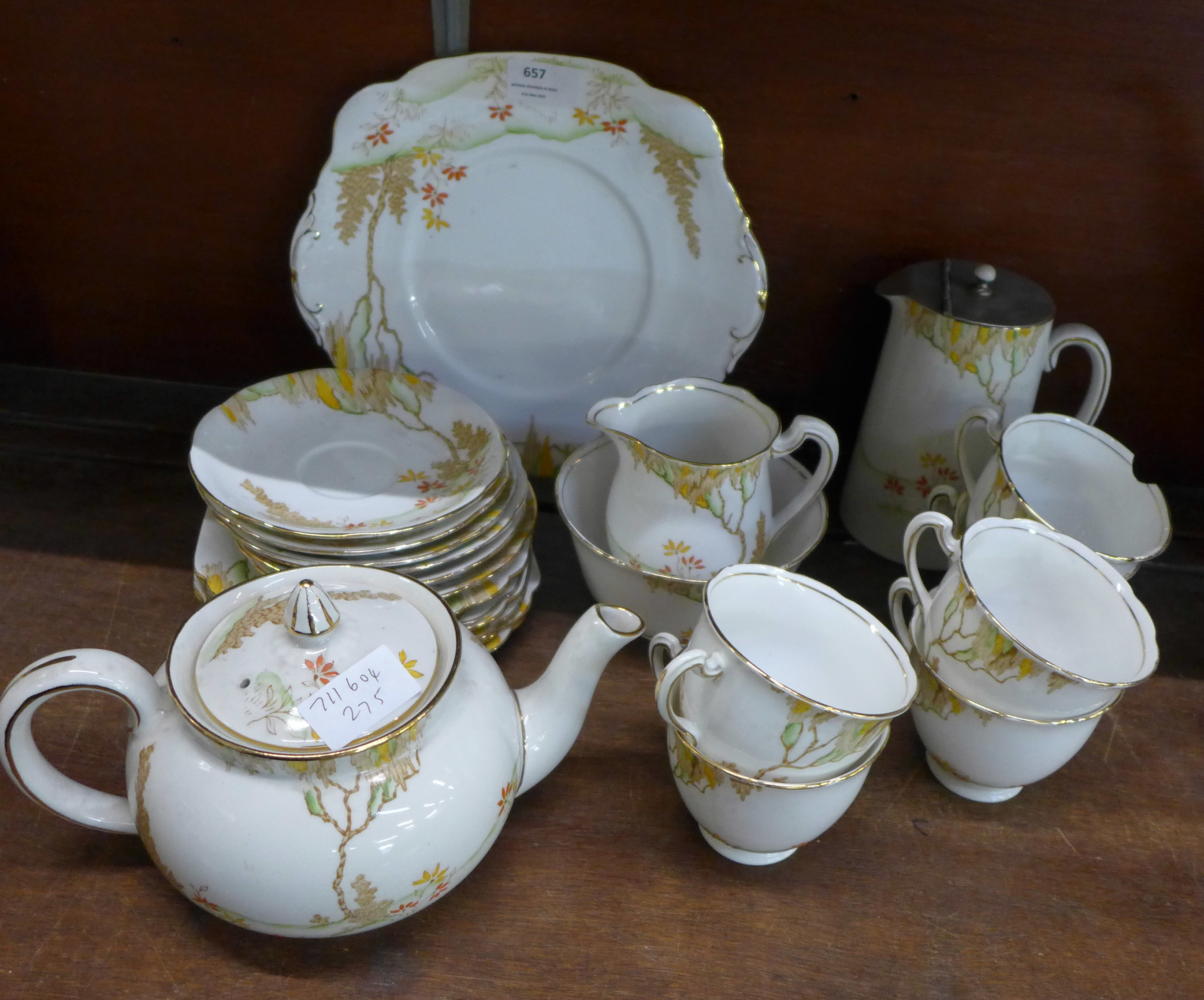 A Standard China Art Deco six setting tea set, with cream, sugar, water jug and teapot