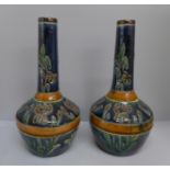 A pair of majolica bottle vases, 34cm