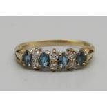 A 9ct gold ring set with blue and white stones, 1.6g, O