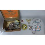 A tin of vintage car badges; Gem, Rover, Nice et Cote d'Azur Automobile Club, Triumph, Commercial