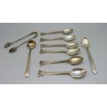 A set of six Siam silver spoons, a pair of silver sugar bows and two other silver spoons, 84g