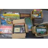 A collection of vintage toys and games, two dolls, Matchbox Motorised Motorway, a bagatelle board,