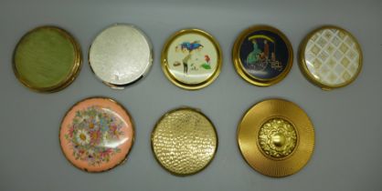 A collection of eight compacts including Stratton