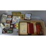 Seven albums of John Player cigarette cards, four small advertising tins of cigarette cards, stamp