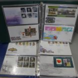Stamps: GB first day covers in two albums, 127 covers from the period 2002-2011, all typed address