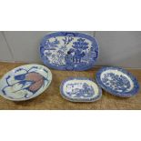 A Chinese dish decorated with a fish, a Willow pattern dish and two drainers, larger drainer a/f