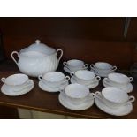 Eight Aynsley soup bowls and a soup tureen 'Whisper Gold' pattern