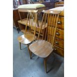 A pair of Ercol Blonde elm and beech Goldsmith chairs