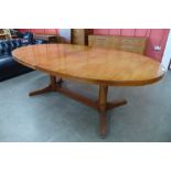 An Archie Shine rosewood extending dining table, designed by Robert Heritage *Accompanied by CITES