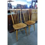 A pair of Ercol Blonde elm and beech 608 model chairs