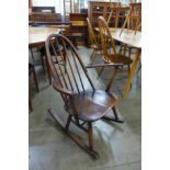 An Ercol dark elm and beech Quaker rocking chair