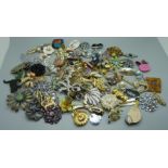 A collection of ninety brooches