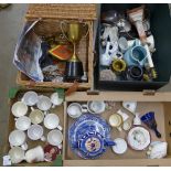 A box of Royal Family related mugs, a bell, a tin, two boxes of mixed china and a basket of