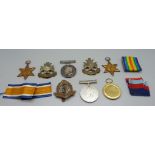 A pair of WWI medals to 29965 Pte. B. Withey York. R., three WII medals, two Notts & Derby badges