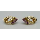 A pair of silver gilt and rhodolite garnet earrings