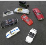 Eight model vehicles including Burago Mercedes 300SL 1954; one plastic and one ceramic