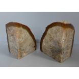 A pair of quartz mineral sample book ends, 14cm