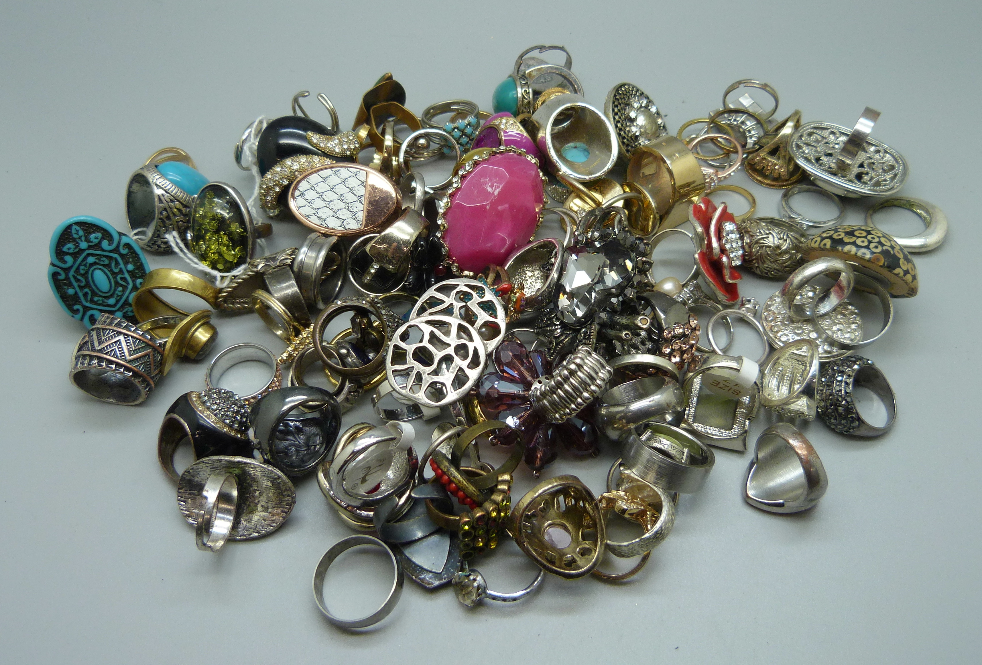 A collection of over 100 costume rings