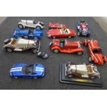 Ten Burago and Maisto large scale die-cast model vehicles; Alfa Romeo, Mercedes Benz and others, two