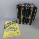 A Melodeon accordion by Worldmaster, boxed