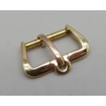 A hallmarked 9ct gold Omega wristwatch strap buckle, Birmingham 1984, 2.4g