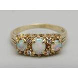 A 9ct gold, opal and diamond ring, 1.9g, M