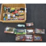 A box of die-cast model vehicles including Matchbox Models of Yesteryear