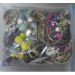 A bag of costume bangles and bracelets